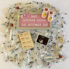 IVF Pregnancy announcement with needles