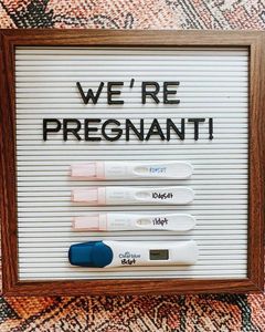 Pregnancy announcement IVF with pregnancy tests